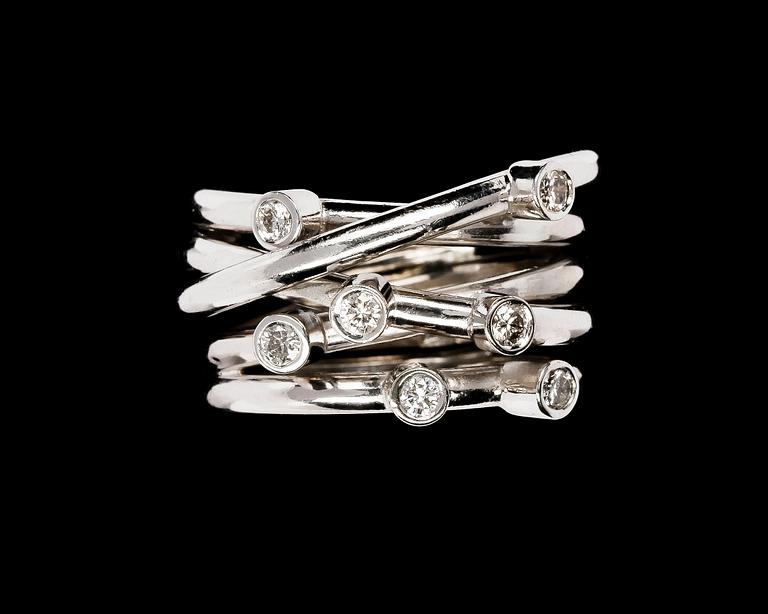 RING, seven brilliant cut diamonds, tot. 0.56 cts. handmade.