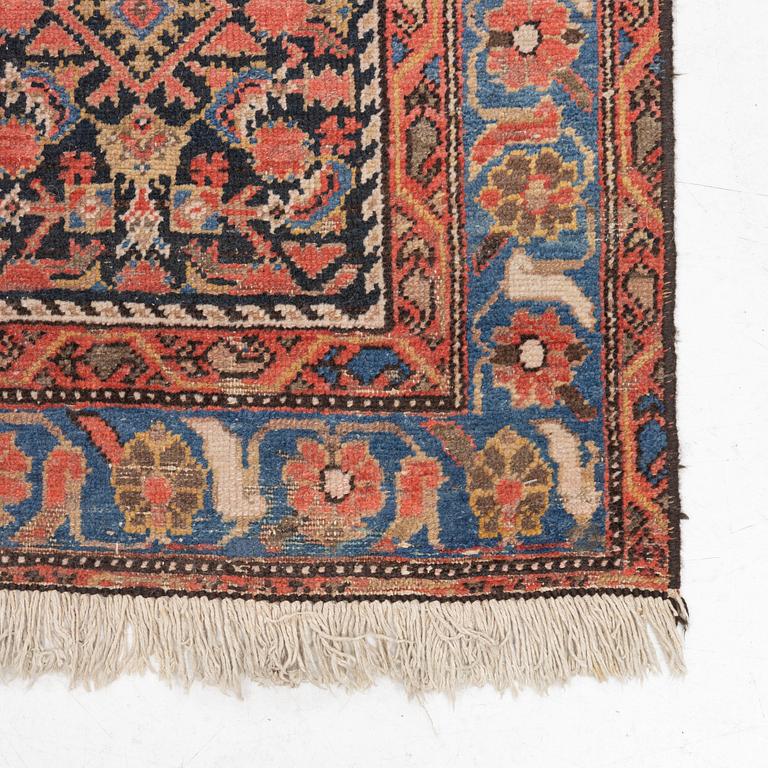 An antique Malayer carpet, west persia c 289 x 149 cm.