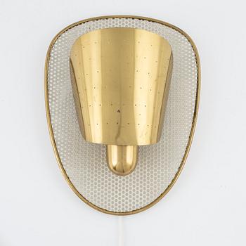 Swedish Modern, a brass wall lamp, 1940-50s.