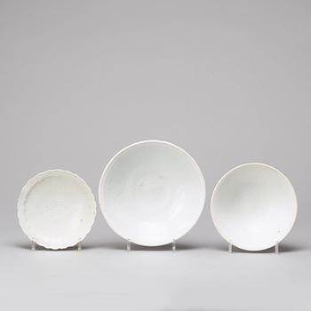 A group of three white glazed dishes, South East Asia, presumably 13th/15th Century.