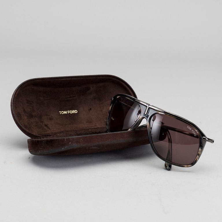 Two pair of Tom Ford Sunglasses.