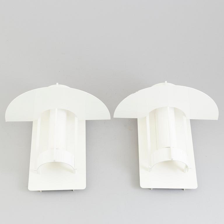 A set of two wall lamps by Joachim Lepper for Louis Poulsen, Danmark.