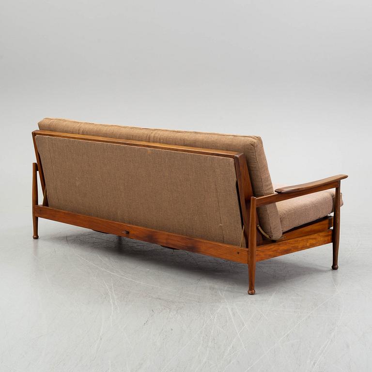 George Fejer & Eric Phamphilan, a British 'Manhattan' sofa and two easy chaits from Guy Rogers, 1960's.