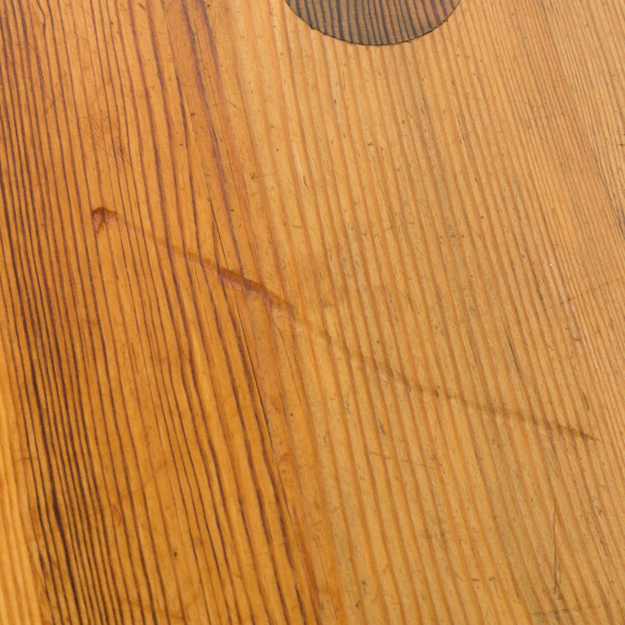 A pine dining table attributed to Roland Wilhelmsson. Second half of the 20th century.