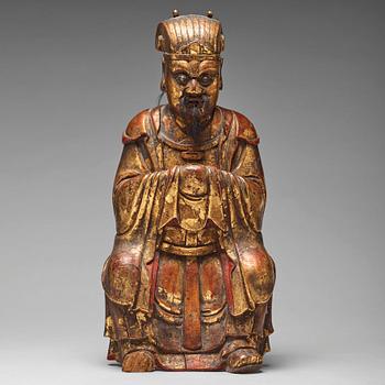 699. A large wooden sculpture of a Daoist dignitary, Qing dynasty, 17/18th Century.