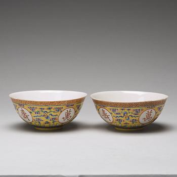 A pair of yellow glazed bowl, Qing dynasty with Guangxu mark in red.