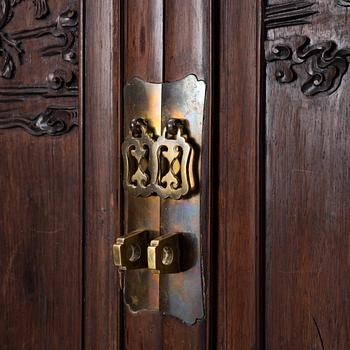 A hardwood cabinet, China, 20th century.