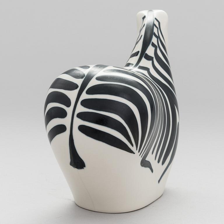 A STONEWARE FIGURINE by LILLEMOR MANNERHEIM, signed Lillemor Arabia -85.