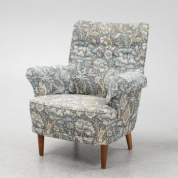 Carl Malmsten, a pair of Hemmakväll easy chairs .