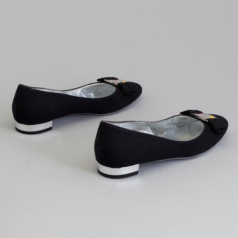 A pair of ballerina shoes by Salvatore Ferragamo.