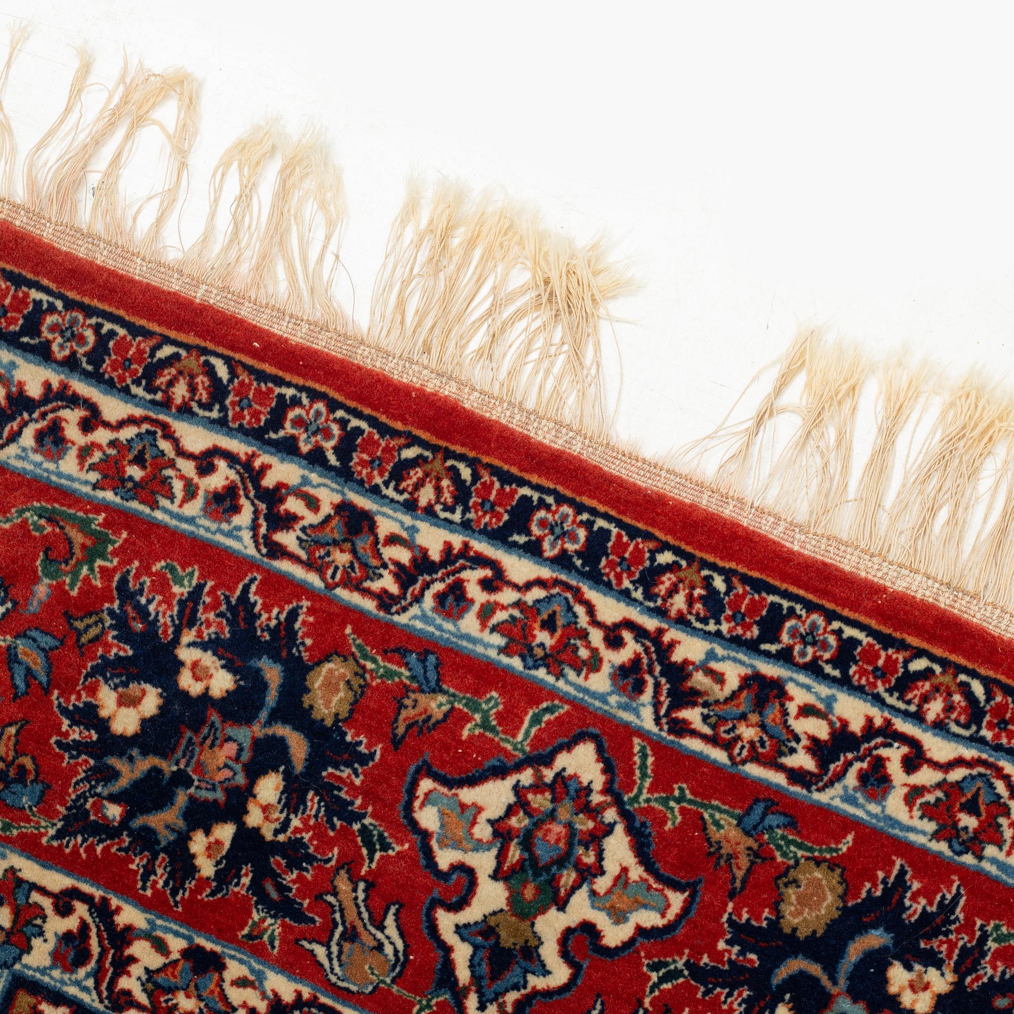 An antique Isfahan, ca 220 x 145 cm.