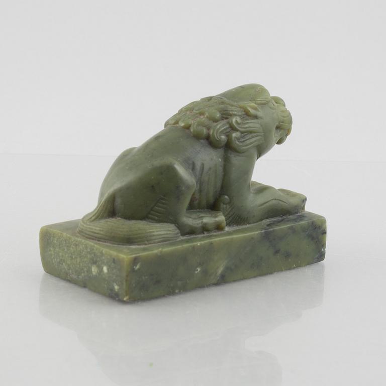 A Chinese stone figure of a lion, 20th century.
