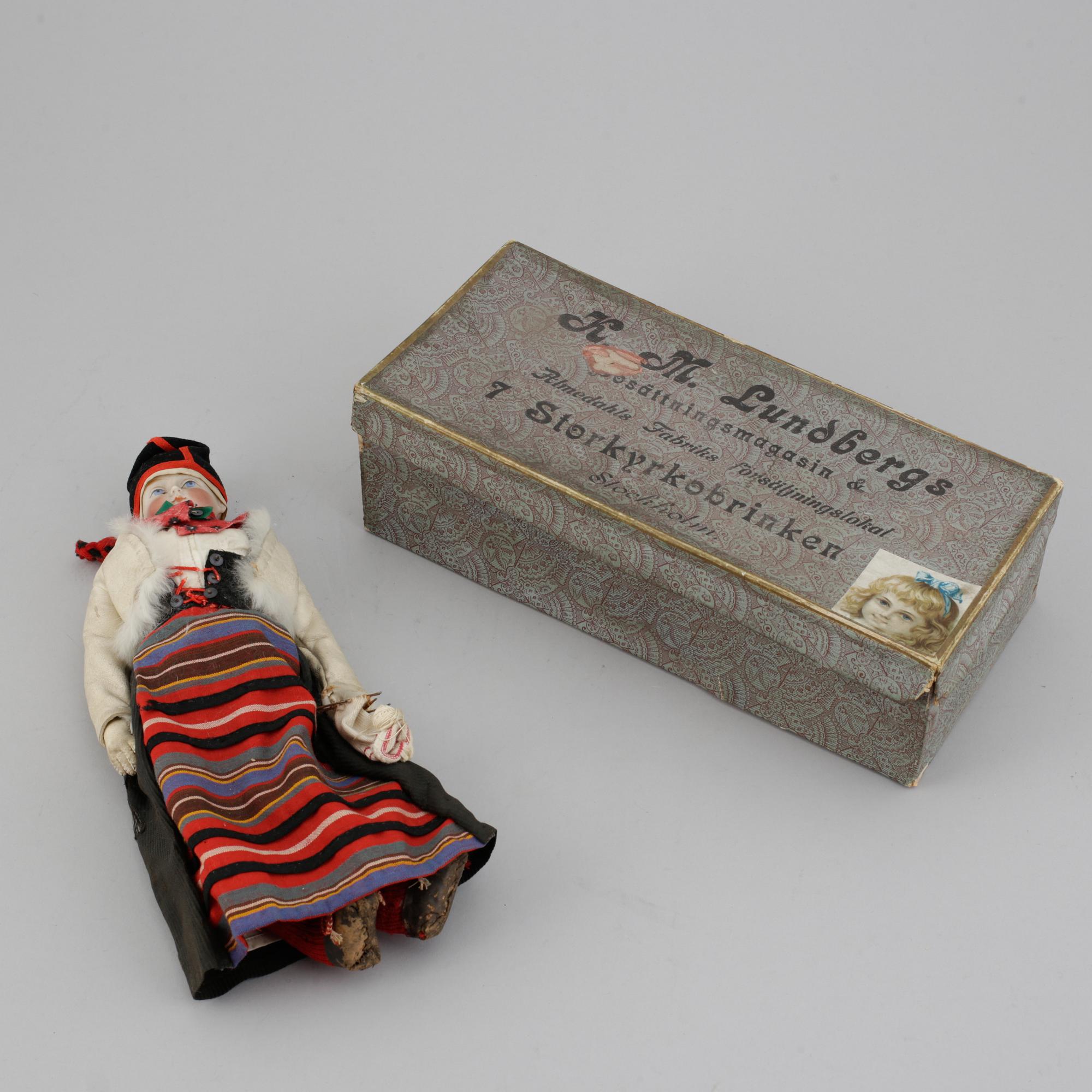 A circa 1900 bisque head doll.