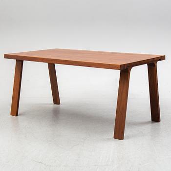 GIJS PAPAVOINE, A walnut 'Doble' dining table from Montis, The Netherlands, 2014.