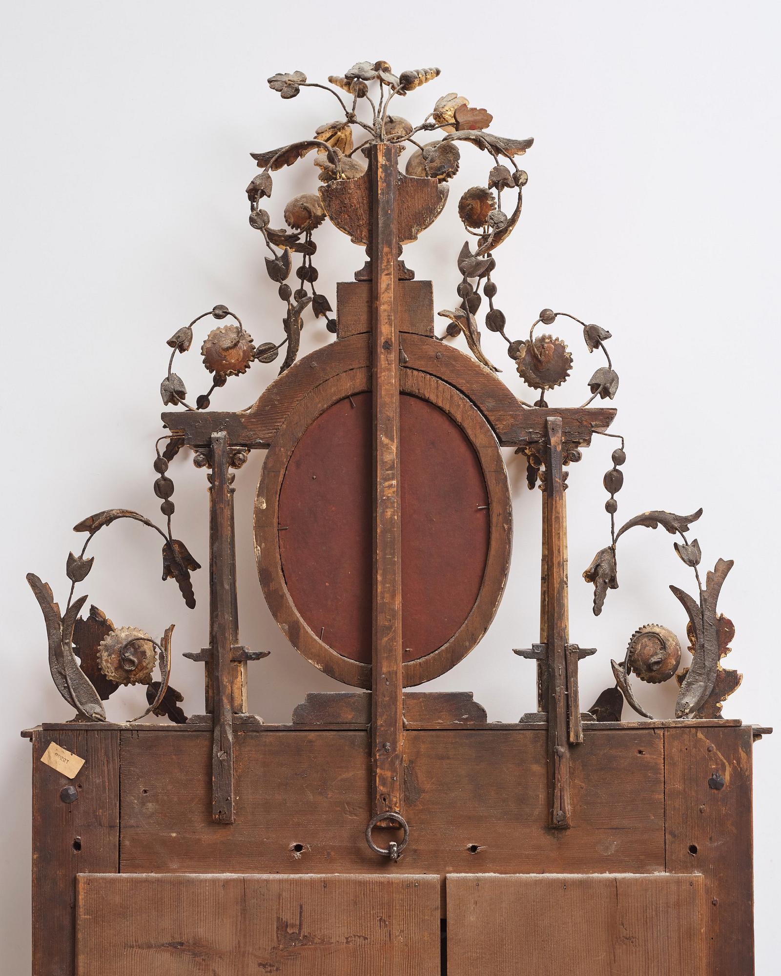 A pair of North-Italian Louis-XVI marble-mounted and carved giltwood mirrors, circa 1800.