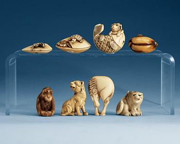 1325. A set of eight Japanese ivory and bone Netsukes, Meiji period.