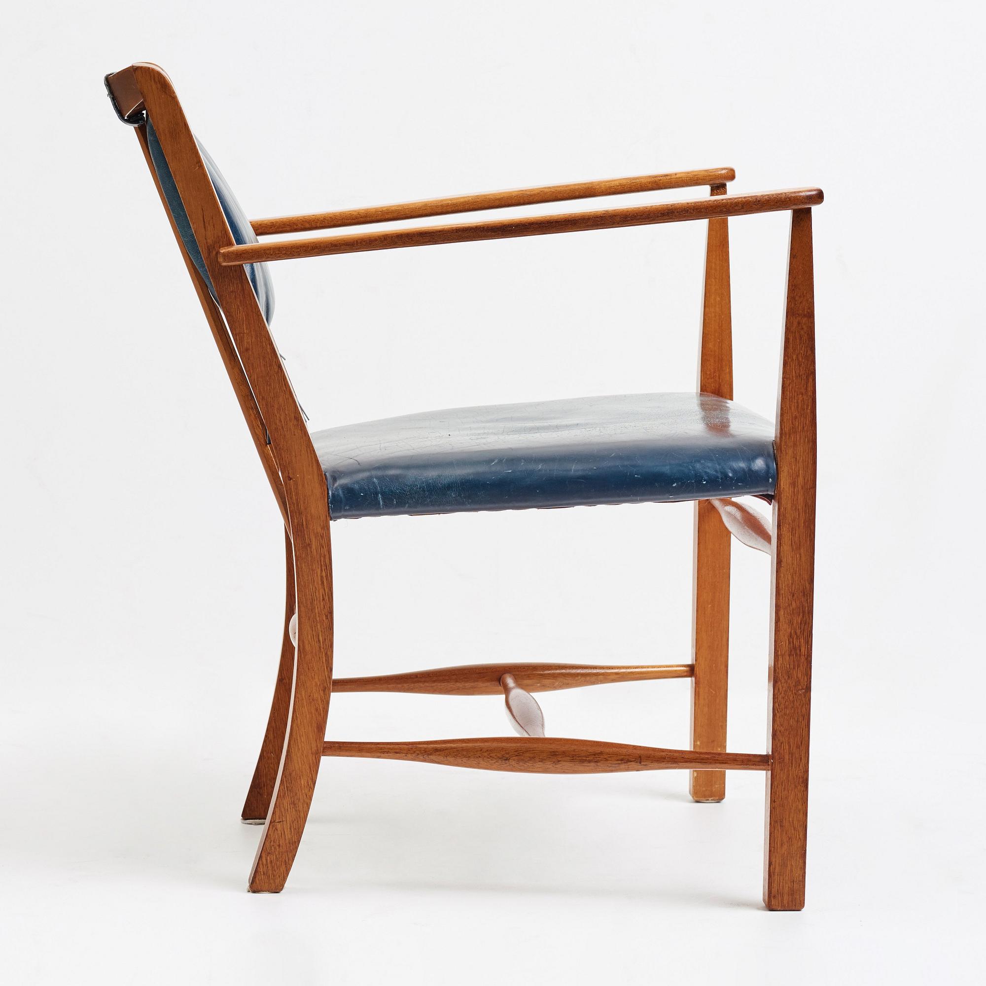 Josef Frank, a mahogany and blue leather chair for Firma Svenskt Tenn, Sweden probably 1950-60's.