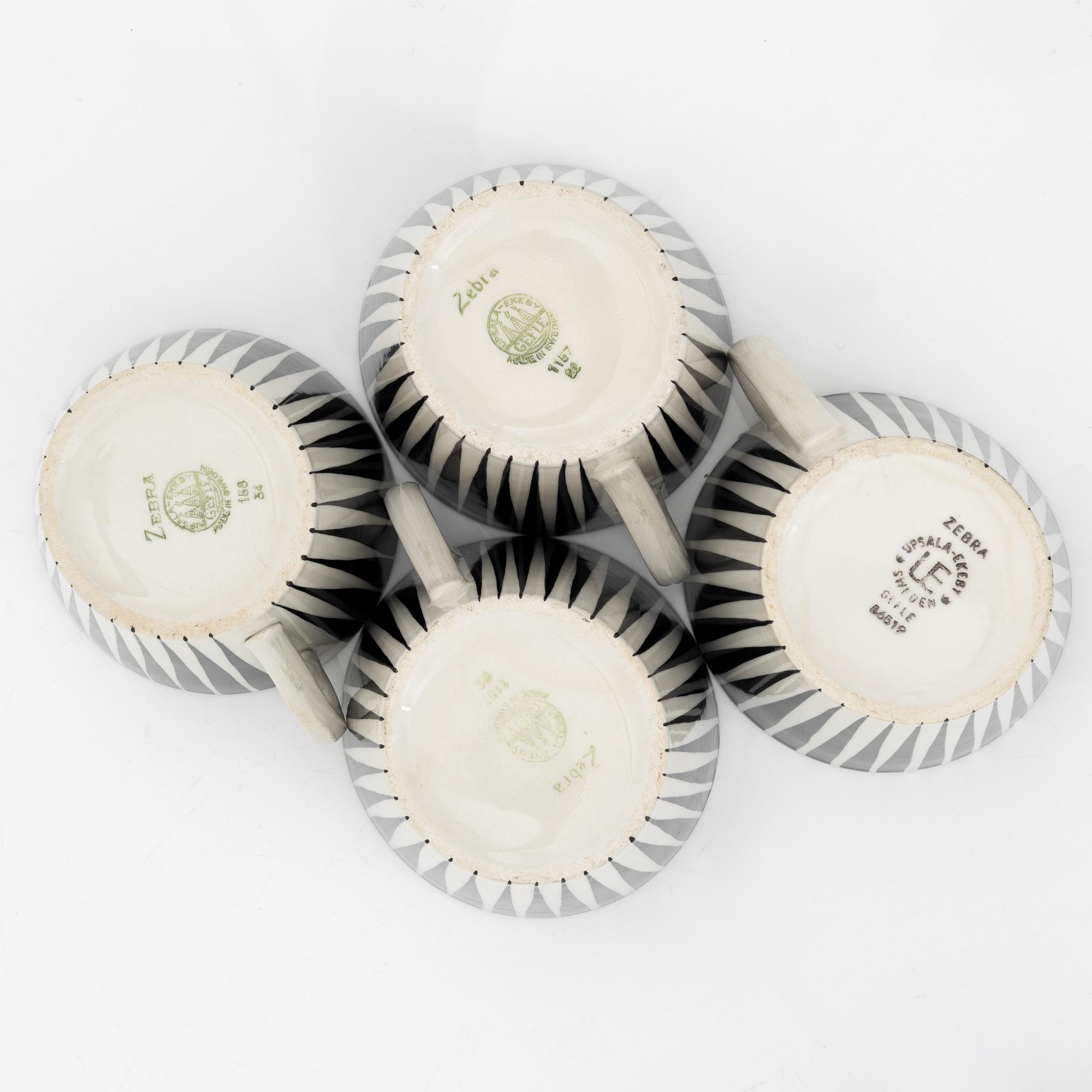 A set of four teacups with saucers  by Eugen Trost for Gefle.