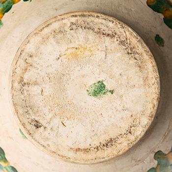 A sancai-glazed pottery jar, Tang dynasty (618-907).