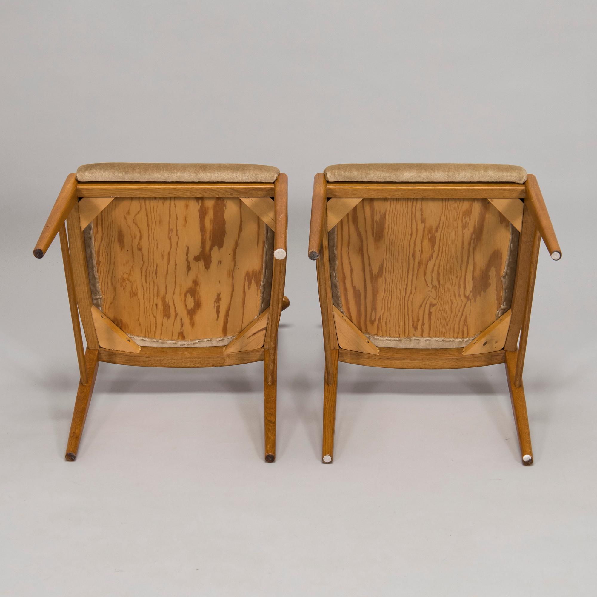 A set of four 1960s oak chairs.