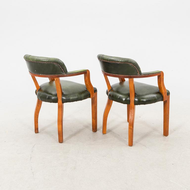 A pair of leather armchairs from the second half of the 20th century.