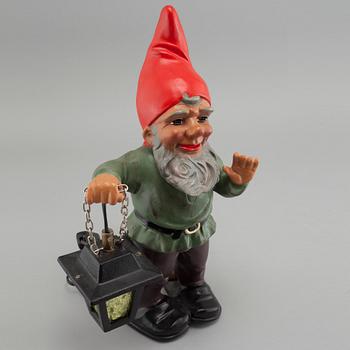 An earthenware gnome with lantern by Heissner, Germany from the second half of the 20th century.