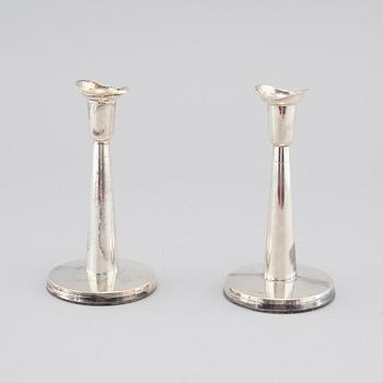 A pair of silver candle sticks by Tore Eld in gothenburg, Sweden, 1959.