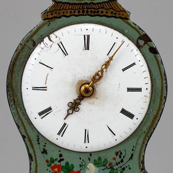 A 19th century tin plate miniature table clock.