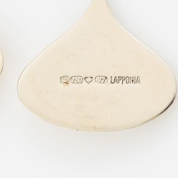 Lapponia, a pair of earrings in 18K white gold and gold set with round brilliant-cut diamonds, Finland 1974.