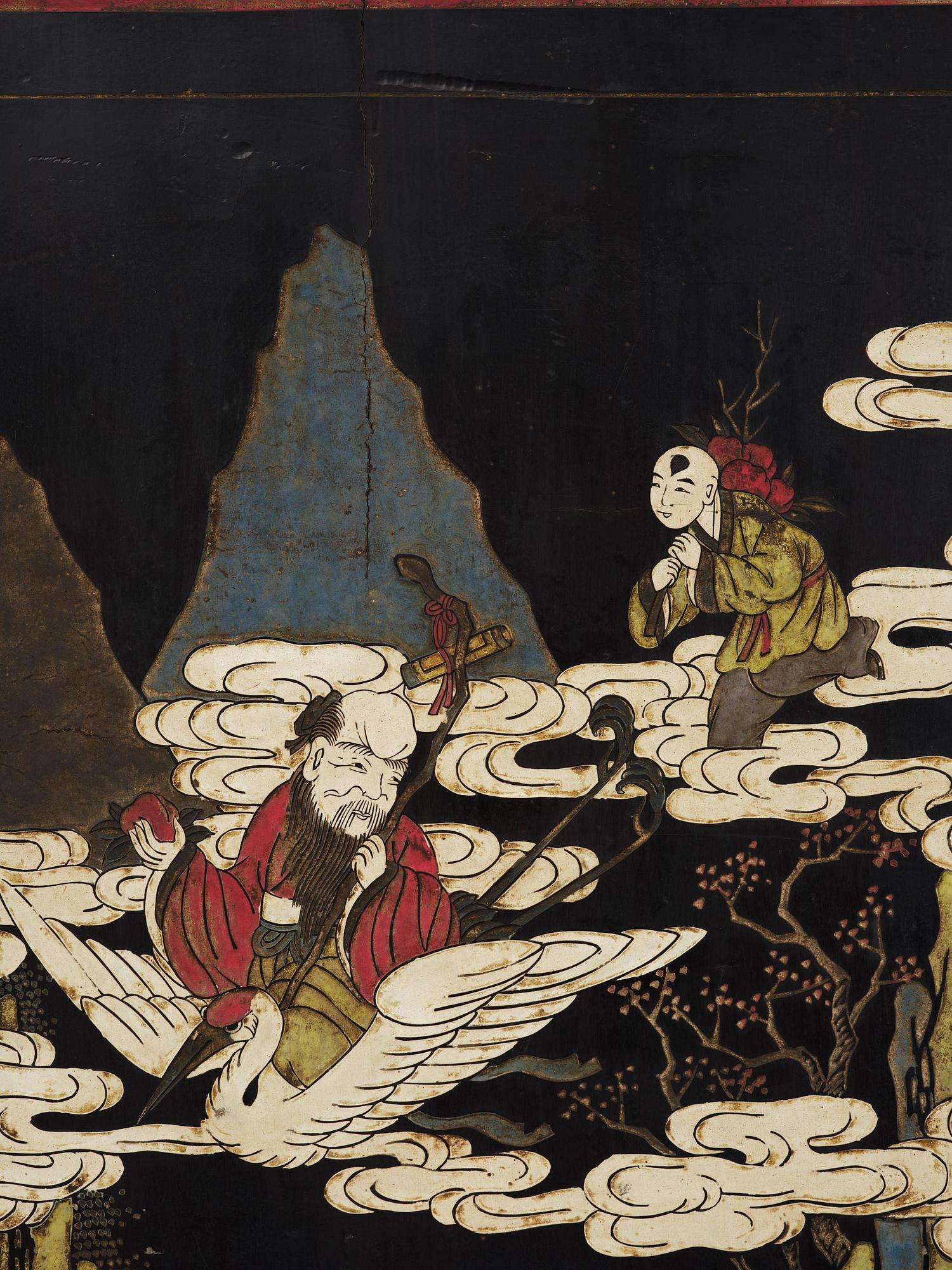 A Chinese four panel lacquer folding screen, first part of the 20th century.