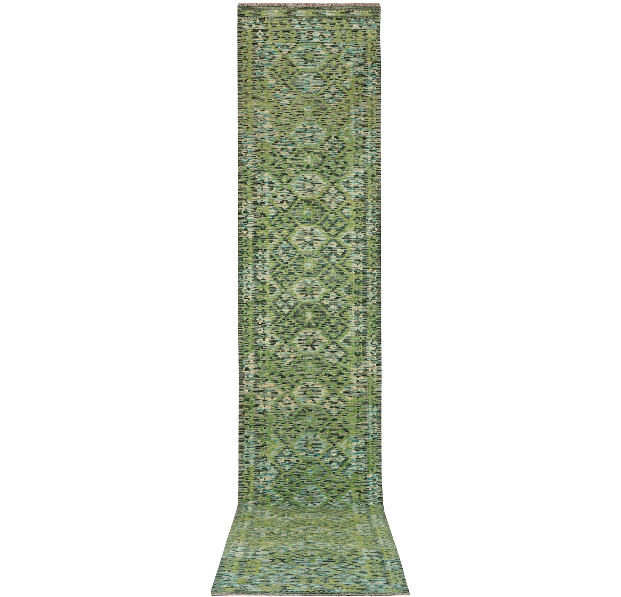 An Afghan kilim runner, c. 488 x 79 cm.