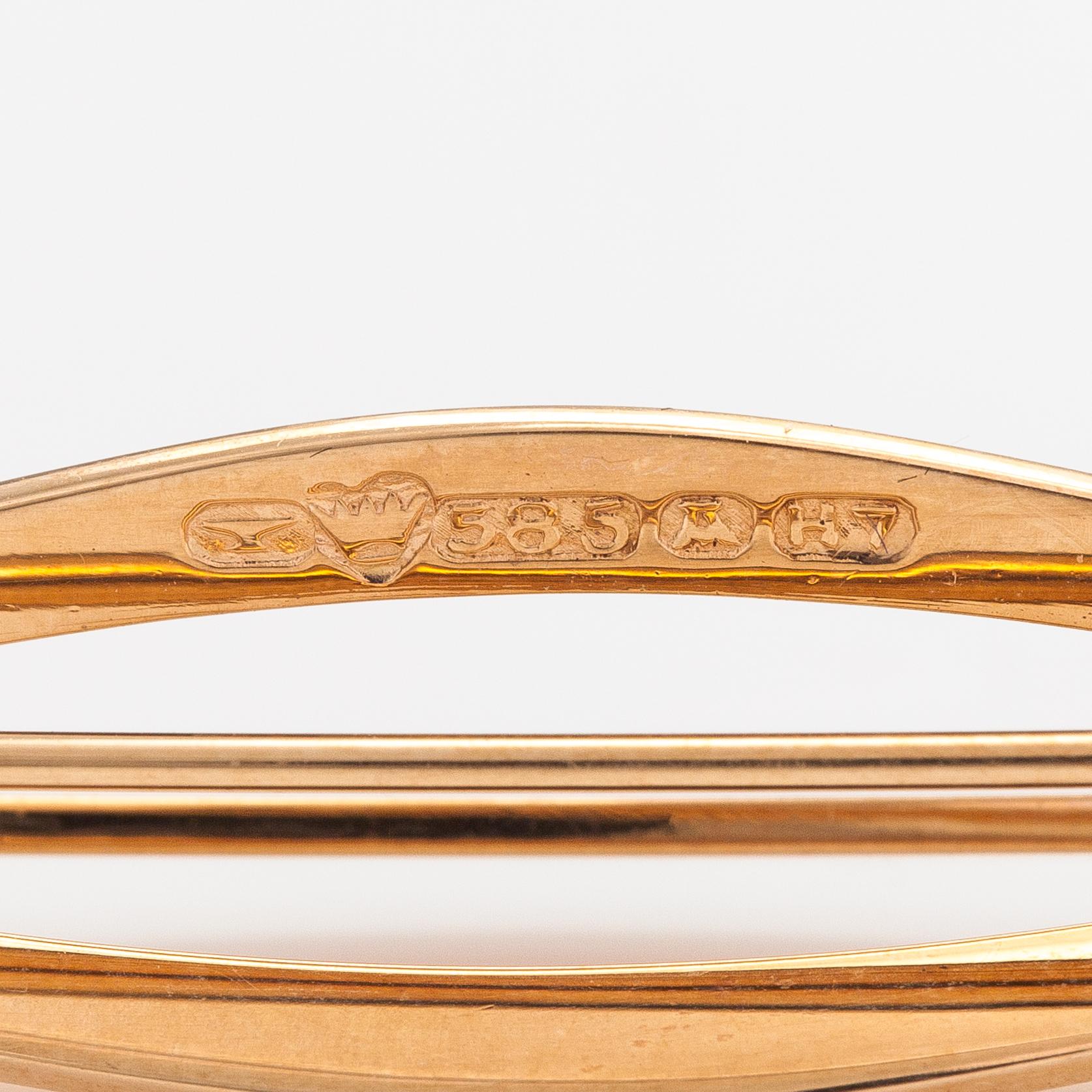 Elis Kauppi, A 14K gold brooch with smoky quartzes. Kupittaan kulta, Turku 1961.