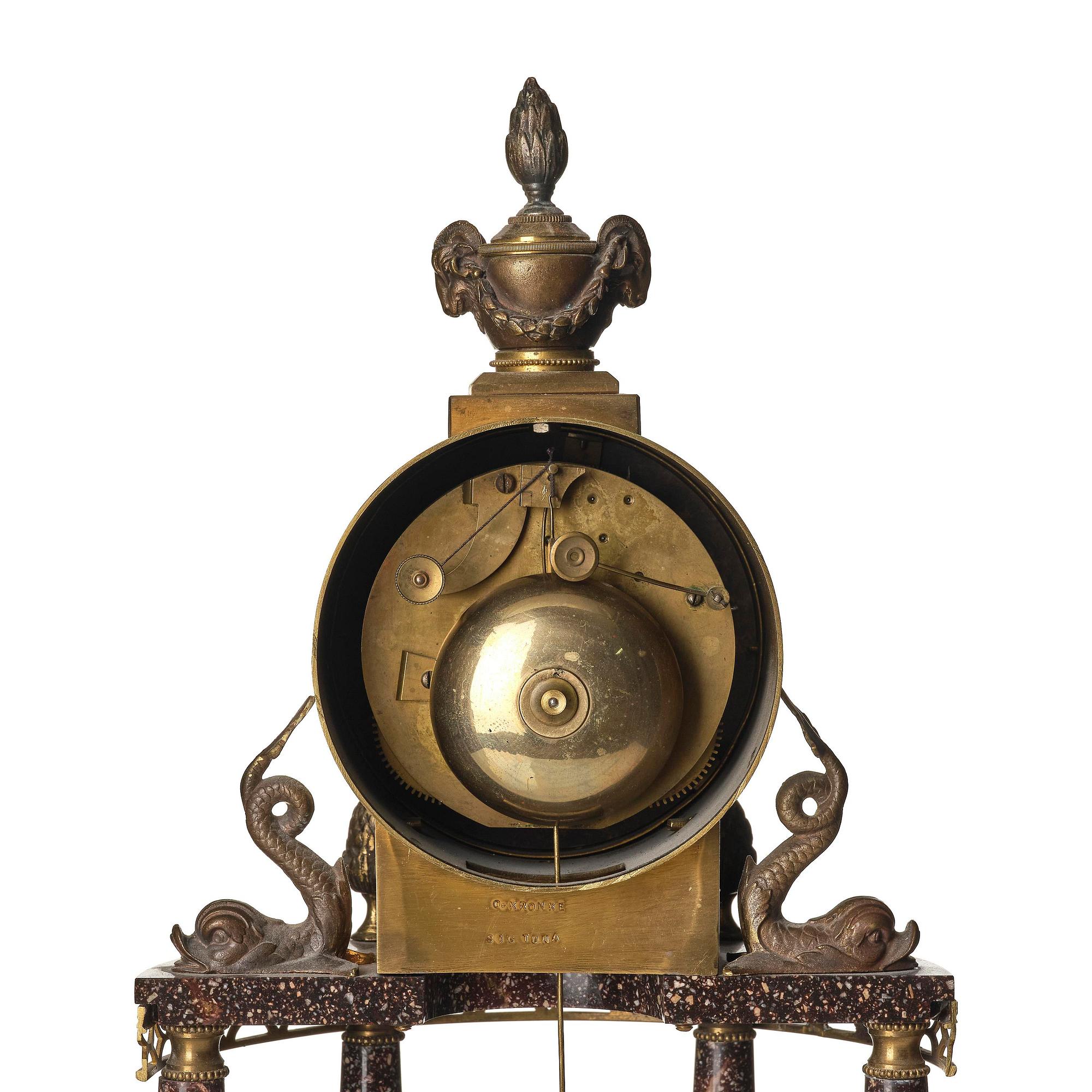 A late Gustavian ormolu and 'Blyberg' porphyry portico clock by E. Engelbrechten (watchmaker in Stockholm 1815-45).