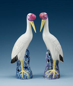 A set of two famille rose figures of cranes, Chinese presumably early 20th Century.