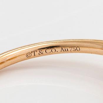 Tiffany & Co, an 18K gold 'T-wire' ring with diamonds.