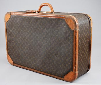 A 1980s monogram canvas suitcase by Louis Vuitton.