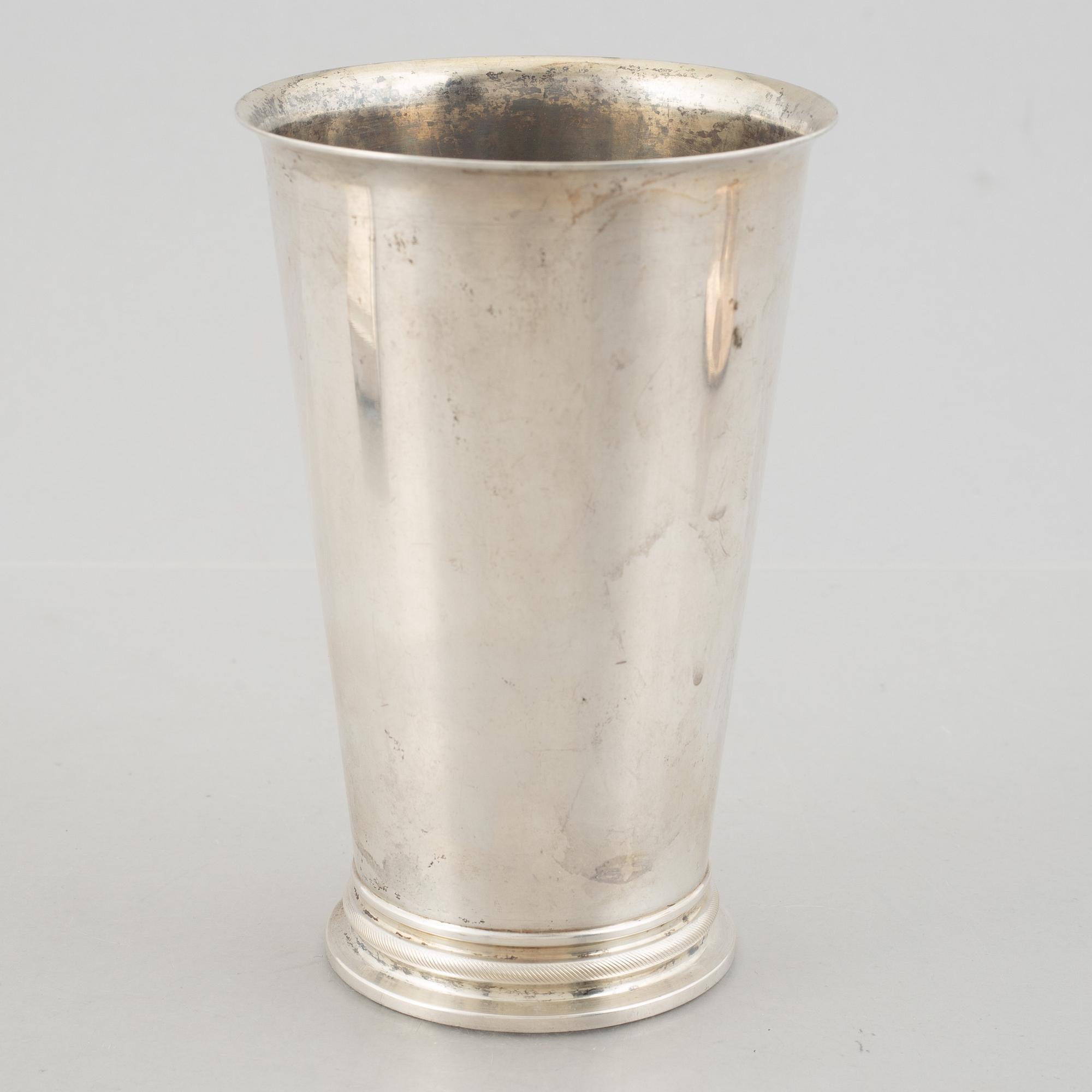 A Swedish silver beaker, an inkwell and a box, including Hugo Grun & Co, Stockholm 1948.