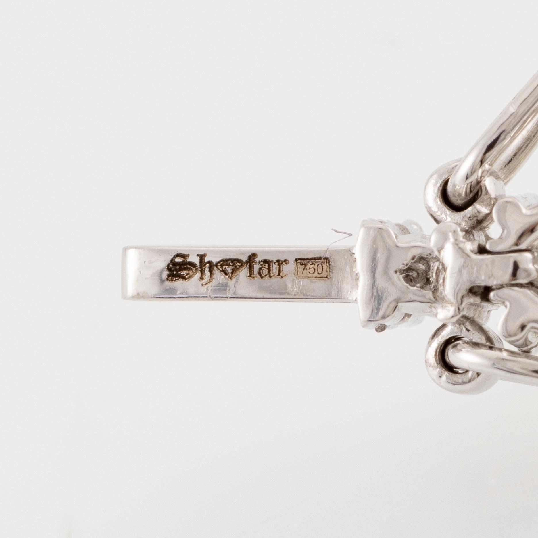 Bracelet 18K white gold with oval and brilliant-cut diamonds.