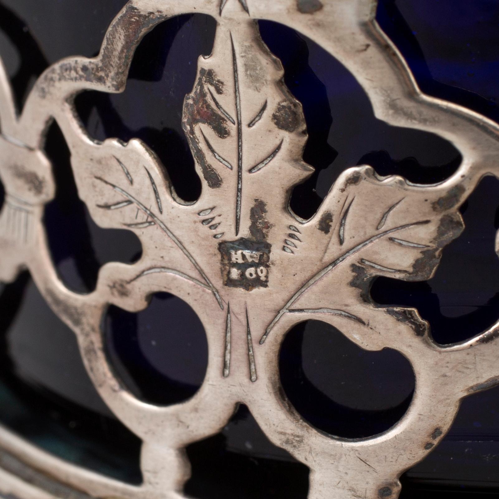 A bowl and a salt cellar, silver and glass. Northern Europe. 19th / 20th century.