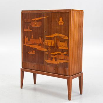 Erik Mattsson, cabinet, "Stockholm,"  executed by Birger Ekman, Mjölby Intarsia for AB Harry Carlsson Stockholm 1940s.