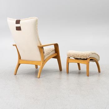 A 'Delta Adventure' armchair with footstool, Brunstad AS, Norway.