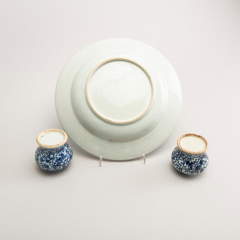 A set of two 19th century blue and white urns and one armorial Qianlong plate.