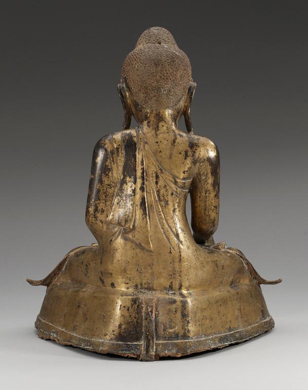 A Burmese gilt bronze figure of Buddha, Mandalay, 19th Century.