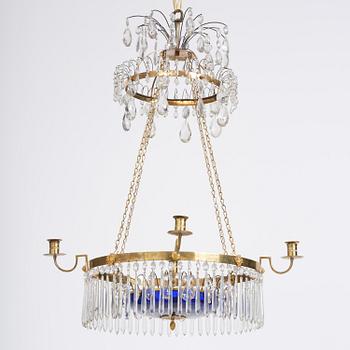 A late Gustavian five-light gilt brass and cut glass chandelier, Stockholm, late 18th century.