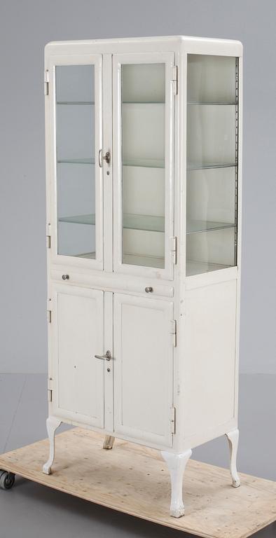 A cupboard  from a doctors practise, 20th century.