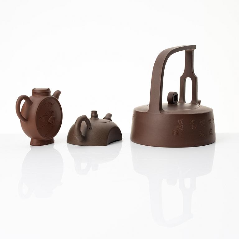 A group of three Chinese yixing teapots, 1980s.