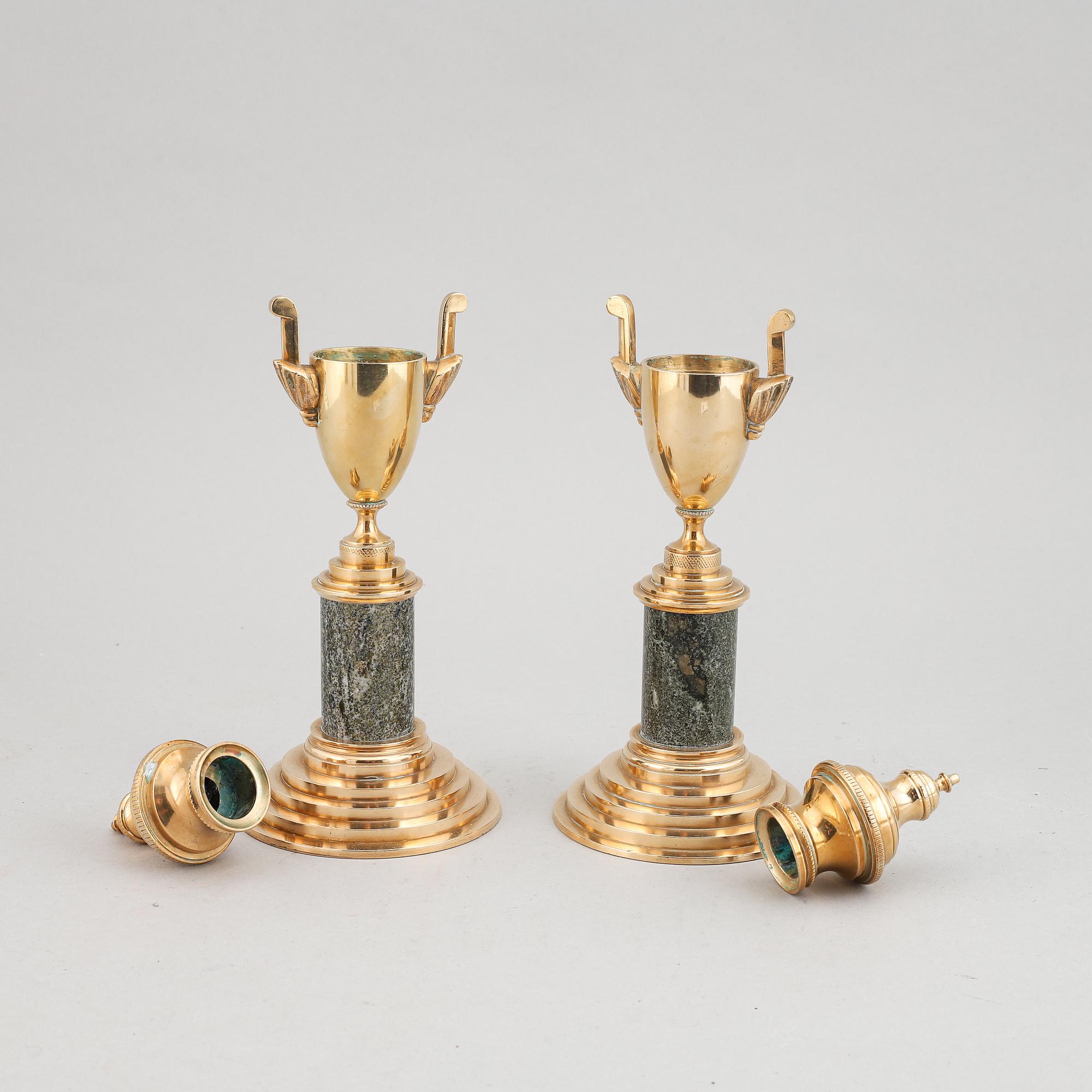 A pair of brass and marble candle holders/casslettes from Skultuna, 20th century.