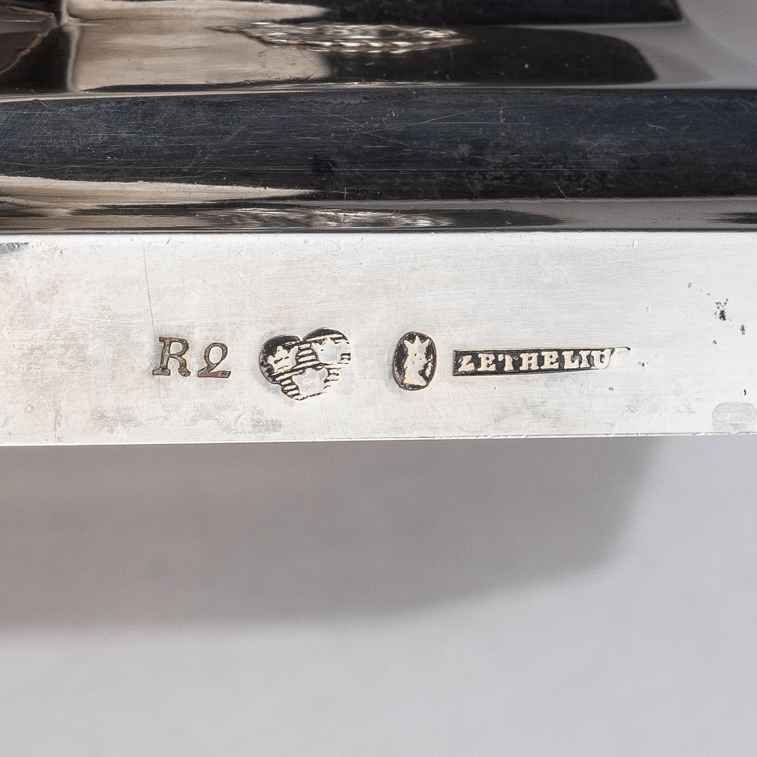 A pair of Swedish Gustavian late 18th century silver candlesticks, marks of Pehr Zethelius, Stockholm 1799.