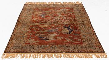 A Turkish rug c. 178 x 122 cm.