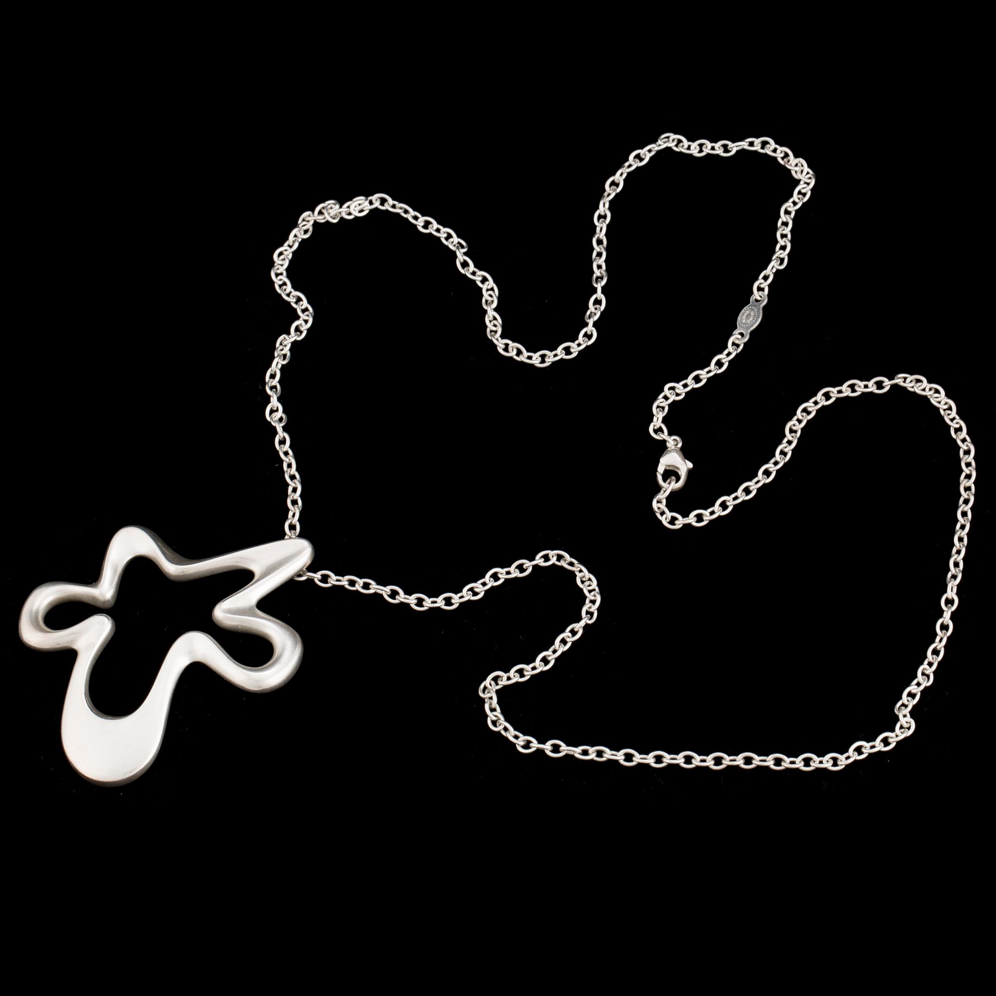 A sterling silver "Splash" pendant by Henning Koppel for Georg Jensen, Denmark.